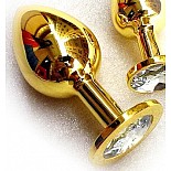 <strong>Золотая анальная пробка GOLDEN PLUG Large прозрачный</strong> <br />
Золотая анальная пробка с шикарным прозрачным стразом на основании - это изящный способ разнообразить интимные моменты вашей близости и приятный подарок для партнера. Используется в качестве интимного украшения. Размер изделия L. Изготовлена из медицинской стали с позолотой. Длина 13 см, диаметр 4 см. Вес 300 гр. <div class="charTableblock"><div><span>Длина, см</span>: 9.50</div><div><span>Диаметр, см</span>: 4.10</div><div><span>Материал</span>: металл</div><div><span>Длина, см</span>: 9-12</div><div><span>Диаметр, см</span>: 4</div></div> Золотая анальная пробка GOLDEN PLUG Large прозрачный 
Золотая анальная пробка с шикарным прозрачным стразом на основании - это изящный способ разнообразить интимные моменты вашей близости и приятный подарок для партнера. Используется в качестве интимного украшения. Размер изделия L. Изготовлена из медицинской стали с позолотой. Длина 13 см, диаметр 4 см. Вес 300 гр.