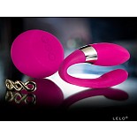 <strong>Вибратор для пар Tiani 2 Design Edition (Lelo)</strong> <br />
Неповторимый массажер для пар, созданный специально с учетом женской анатомии!
Tiani™ 2 Design Edition стала усовершенствованной версией нашего знаменитого интимного массажера для пар, уже выигравшего престижную награду в области промышленного дизайна Red Dot. Улучшенная форма Tiani 2 позволяет максимально эффективно массировать точку G! Его загнутый кончик при введении внутрь будет располагаться точно на этой точке, обеспечивая хорошую стимуляцию и даря яркие ощущения и восхитительные оргазмы. Tiani 2 удобен тем, что при желании Вы всегда можете вернуться к предыдущей версии, ведь насадка Tiani входит в комплект. Решайте сами, какой Tiani Вы хотите сегодня!
<br><br>
Уникальная технология SenseMotion™ от LELO позволяет контролировать стимуляцию с помощью беспроводного пульта управления непосредственно во время близости. Но теперь, благодаря новым разработкам, нам удалось усилить сигнал, передаваемый из пульта, в 3 раза, а мощность вибраций - на 50%!
Полностью водонепроницаемая поверхность облегчает уход за массажером и предлагает новые возможности для игр в ванне или душе.
<br><br>
Управлять Tiani™ 2 можно как с помощью пульта, так и без него. Мы также снабдили эту модель дополнительным хвостиком, который поможет Вам подобрать идеальные точки стимуляции. Мы надеемся, что новая Tiani™ 2 снимет все препятствия на Вашем пути к безграничному наслаждению!
<br><br>
Покрытие: Матовый силикон/Блестящий ABS пластик. <div class="charTableblock"> </div> Вибратор для пар Tiani 2 Design Edition (Lelo)
Неповторимый массажер для пар, созданный специально с учетом женской анатомии!
Tiani™ 2 Design Edition стала усовершенствованной версией нашего знаменитого интимного массажера для пар, уже выигравшего престижную награду в области промышленного дизайна Red Dot. Улучшенная форма Tiani 2 позволяет максимально эффективно массировать точку G! Его загнутый кончик при введении внутрь будет располагаться точно на этой точке, обеспечивая хорошую стимуляцию и даря яркие ощущения и восхитительные оргазмы. Tiani 2 удобен тем, что при желании Вы всегда можете вернуться к предыдущей версии, ведь насадка Tiani входит в комплект. Решайте сами, какой Tiani Вы хотите сегодня!
<br><br>
Уникальная технология SenseMotion™ от LELO позволяет контролировать стимуляцию с помощью беспроводного пульта управления непосредственно во время близости. Но теперь, благодаря новым разработкам, нам удалось усилить сигнал, передаваемый из пульта, в 3 раза, а мощность вибраций - на 50%!
Полностью водонепроницаемая поверхность облегчает уход за массажером и предлагает новые возможности для игр в ванне или душе.
<br><br>
Управлять Tiani™ 2 можно как с помощью пульта, так и без него. Мы также снабдили эту модель дополнительным хвостиком, который поможет Вам подобрать идеальные точки стимуляции. Мы надеемся, что новая Tiani™ 2 снимет все препятствия на Вашем пути к безграничному наслаждению!
<br><br>
Покрытие: Матовый силикон/Блестящий ABS пластик.